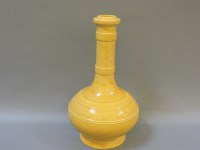 Lot 431 - A yellow glazed vase