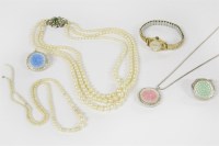 Lot 66 - A three row graduated cultured pearl necklace