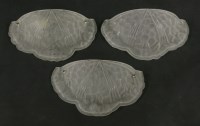 Lot 233 - Three moulded glass wall lights