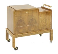 Lot 354 - An Art Deco walnut drinks trolley