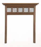 Lot 30 - A walnut fire surround