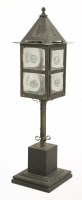 Lot 72 - An Arts & Crafts copper and metal newel post lantern