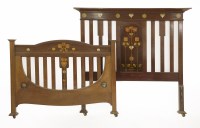 Lot 153 - A mahogany inlaid double bed