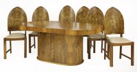Lot 270 - An Art Deco walnut dining room suite