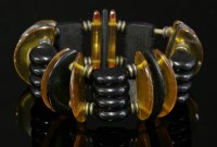 Lot 226 - An Art Deco Bakelite and early plastic bead bracelet
