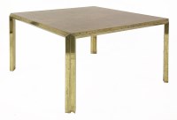 Lot 750 - A walnut veneered and brass coloured centre table