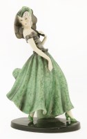 Lot 198 - A Goldscheider figure of a lady holding a parasol