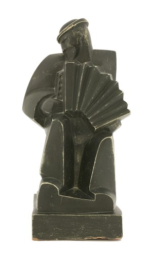 Lot 175 - A model of an accordion player