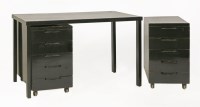 Lot 303 - A desk and a pair of drawers in black