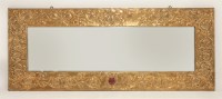 Lot 70 - An Arts and Crafts copper embossed overmantel mirror