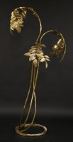 Lot 558 - A brass three-branch standard lamp