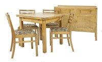 Lot 157 - An oak dining room suite