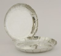 Lot 451 - A pair of George II silver strawberry dishes