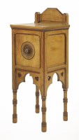 Lot 10 - A pine bedside cupboard