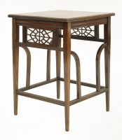 Lot 5 - A walnut centre table