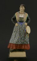 Lot 82A - A pottery figure