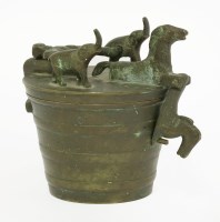 Lot 200 - A set of nine bronze cup weights
