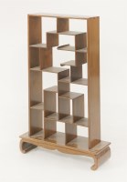 Lot 191 - A Chinese hardwood open table stand