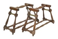 Lot 185 - A pair of mahogany bowls ball stands