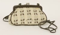 Lot 1102 - A Prada micro evening handbag
