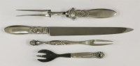 Lot 36 - A pair of Georg Jensen silver ‘Cactus’ pattern carvers