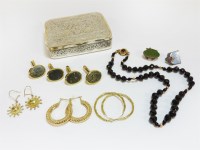 Lot 1193 - A single row of facetted garnet beads