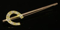 Lot 75 - A Victorian diamond set gold horseshoe