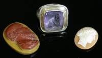 Lot 130 - An unmounted oval jasper hardstone cameo