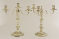 Lot 450 - A pair of Elizabeth II silver three-light candelabrum