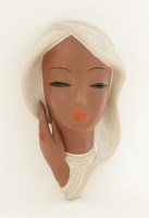 Lot 95 - A Goldscheider terracotta pottery wall mask