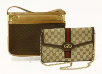 Lot 1115 - A Gucci vintage tan leather and monogrammed canvas handbag