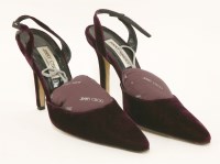 Lot 1418 - A pair of Jimmy Choo burgundy velvet high heel shoes