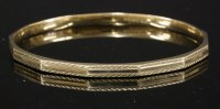Lot 171 - A 9ct gold Art Deco hollow slave bangle