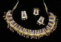 Lot 254 - An Indian high carat gold synthetic sapphire