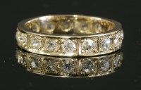 Lot 161 - A rose gold full eternity ring