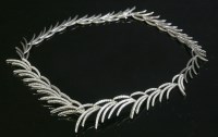 Lot 318 - A Continental white gold diamond set graduated spray necklace