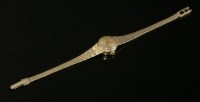 Lot 360 - A ladies' 9ct gold Marvin 'Revue' quartz bracelet watch