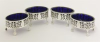 Lot 494 - A set of four George III silver salts