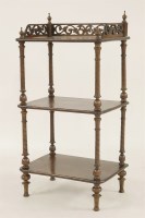 Lot 504 - A Victorian burr walnut three tier whatnot