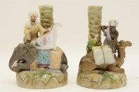Lot 165 - A pair of late 19th century German porcelain candlesticks by Ernst Bohne Sohne