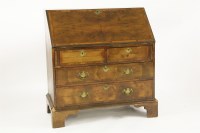 Lot 452 - A George lll mahogany and cross banded bureau