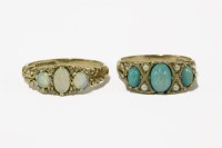 Lot 5 - A 9ct gold three stone graduated opal boat shaped ring