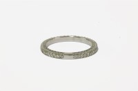Lot 11 - A white gold diamond set full eternity ring