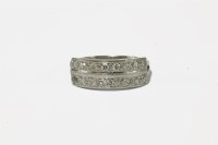 Lot 14 - A two row diamond half eternity ring