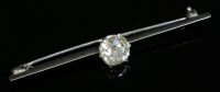 Lot 171 - A single stone diamond bar brooch