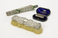 Lot 145 - An Edwardian silver and green glass perfume phial
