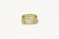 Lot 71 - An 18ct two colour three row band ring