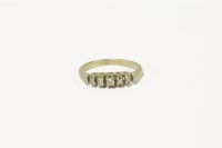 Lot 102 - A white gold five stone graduated diamond ring
