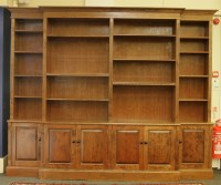 Lot 530 - A Victorian design walnut breakfront bookcase