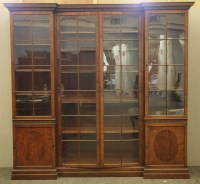 Lot 615 - An early 20th century Adam revival mahogany inverted breakfront bookcase